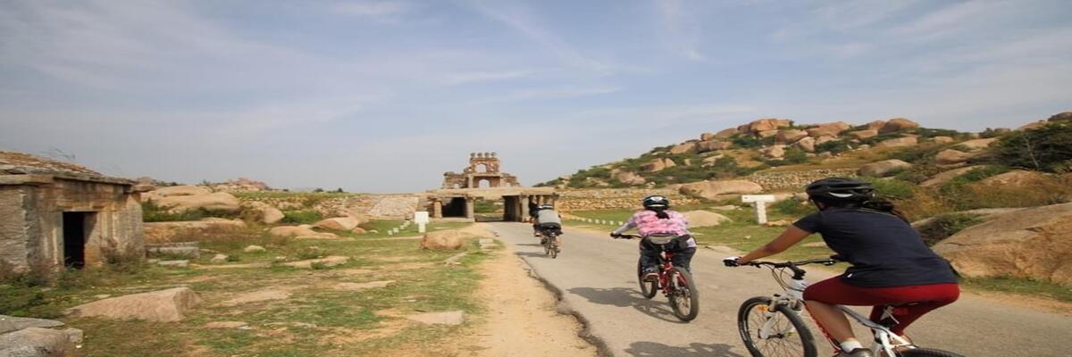 Group Cycling Trail Across Hampi Ruins